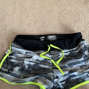 One green and black Athletic shorts